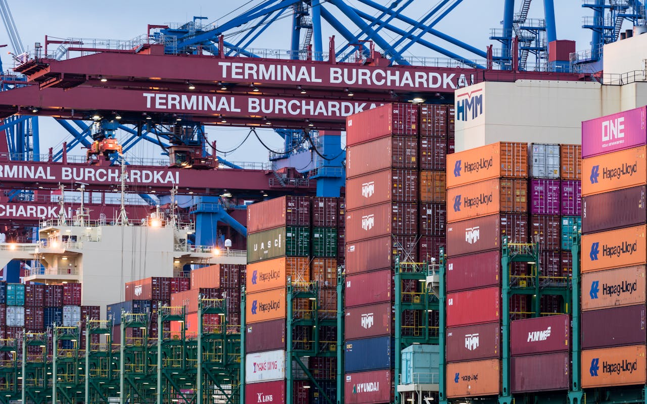 View of shipping containers and cranes at Hamburg