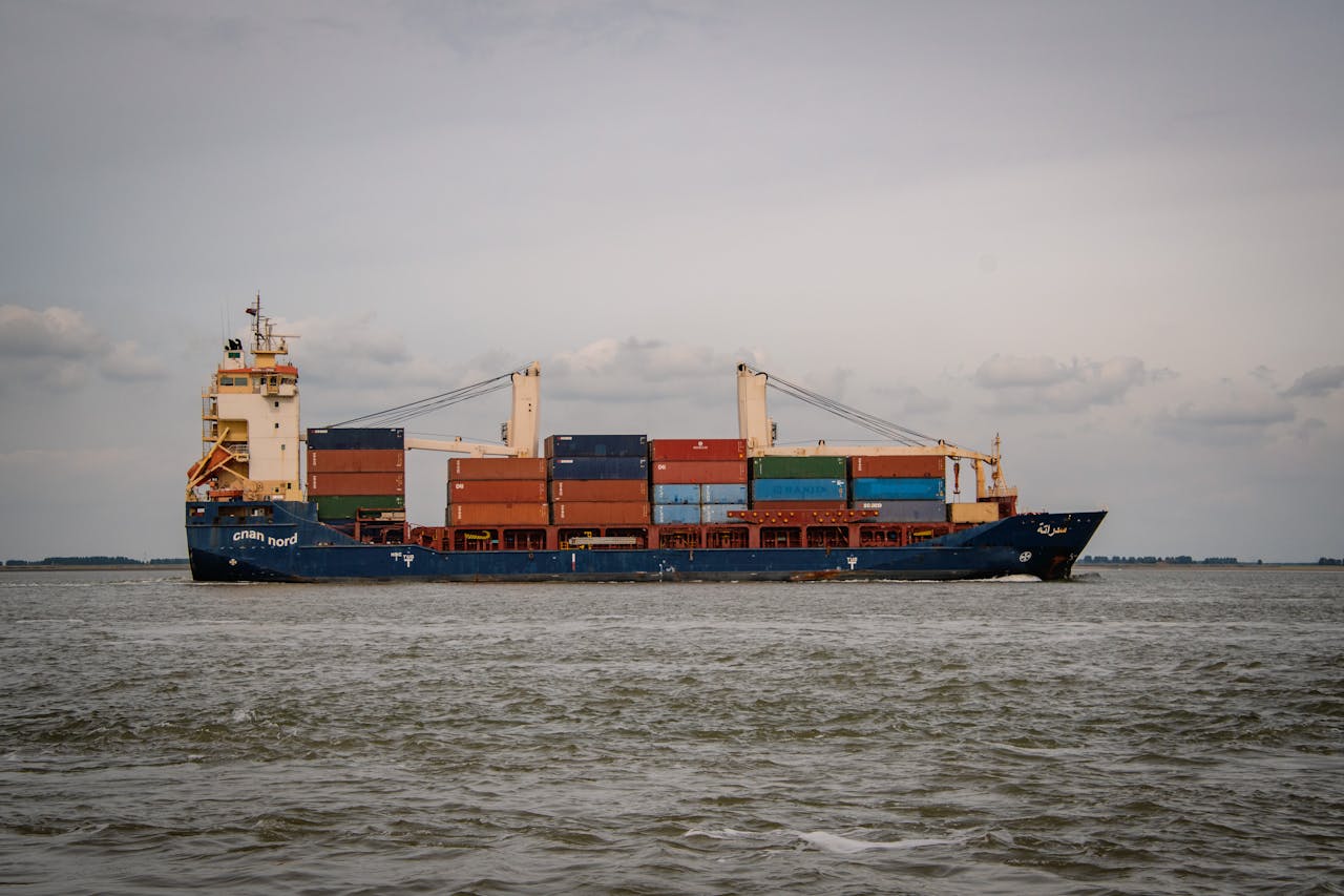About Container ship sailing through the waters of Terneuzen, Netherlands.